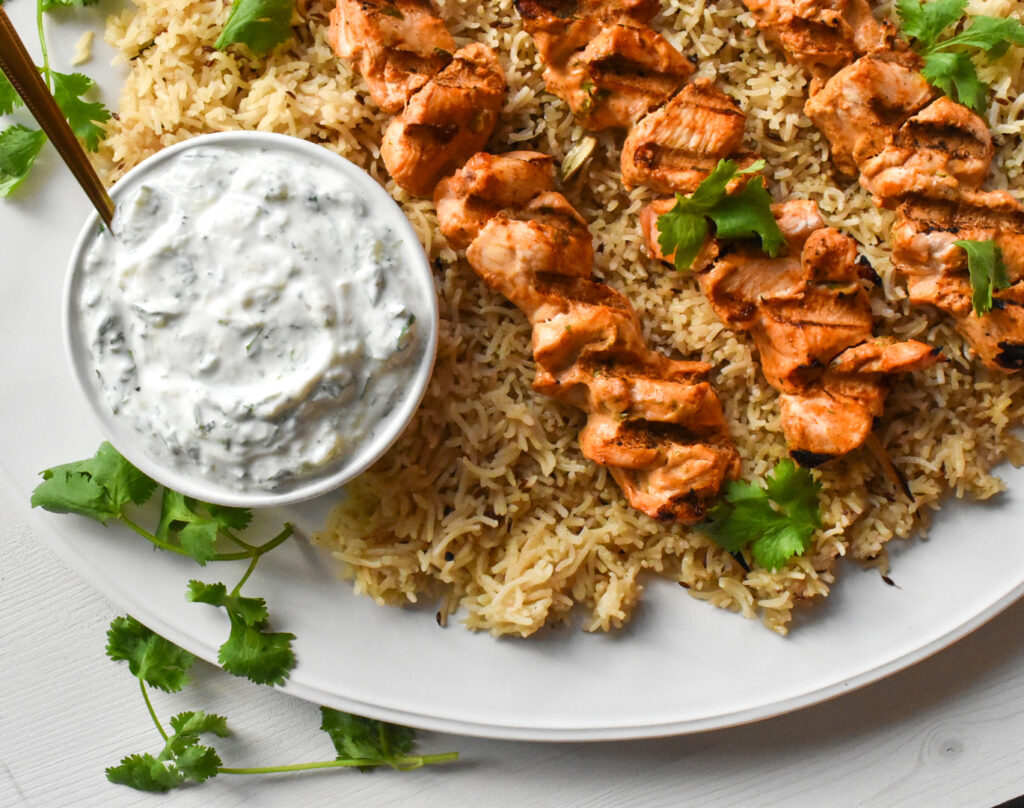 Grilled Chicken Tikka Skewers with Jeera Rice & Cucumber Raita