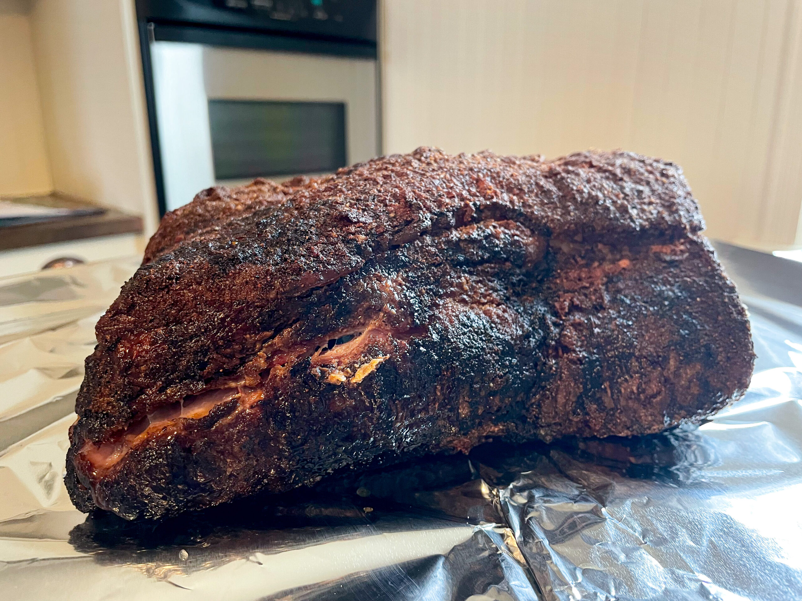 Wrapping a smoked pork butt. Smoked Pulled Pork Recipe.