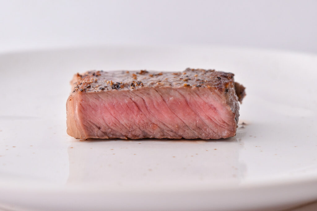Steak Doneness Levels: Medium steak pictured at the perfect temperature doneness